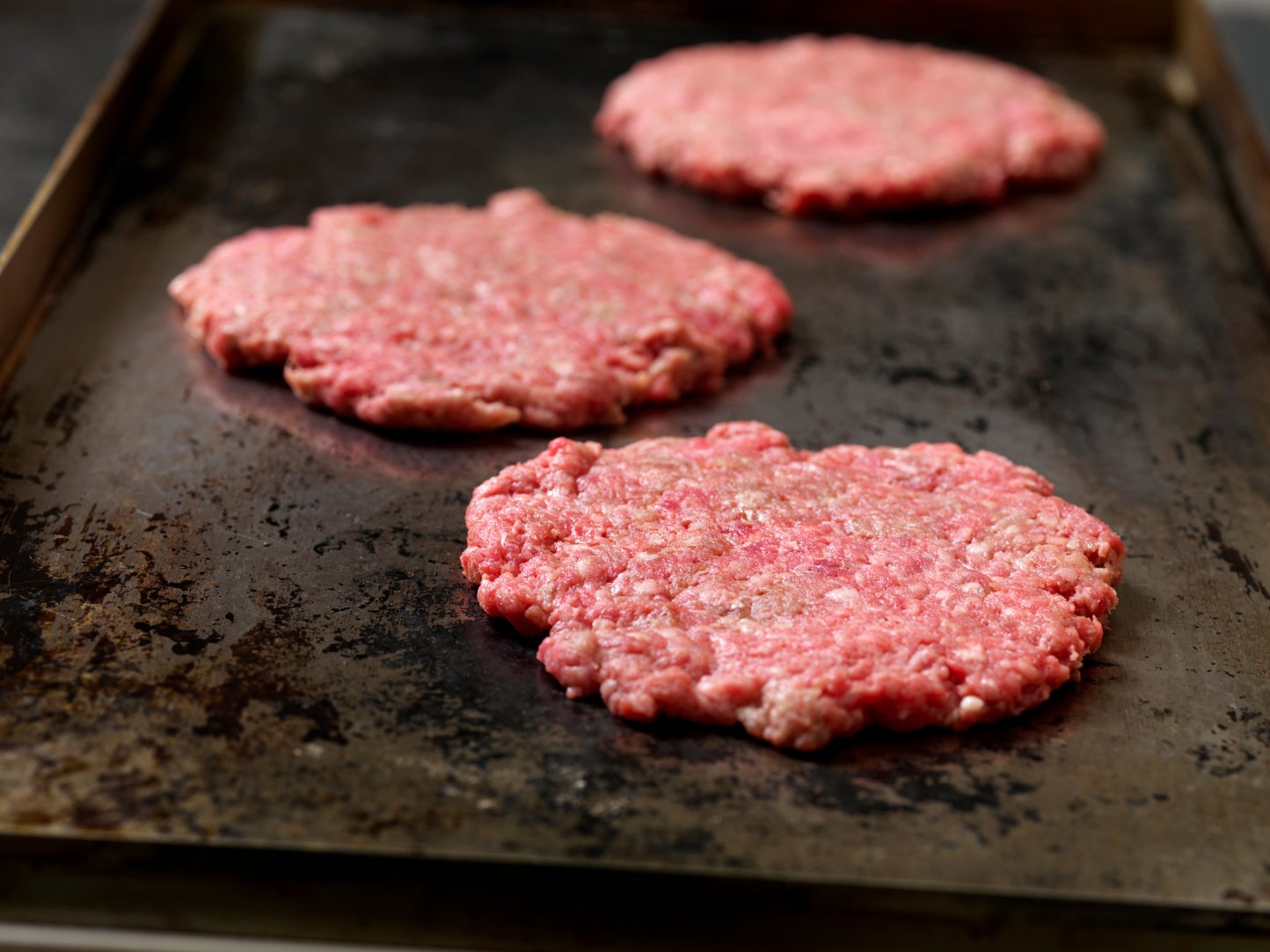 Frying Beef Smash Burgers